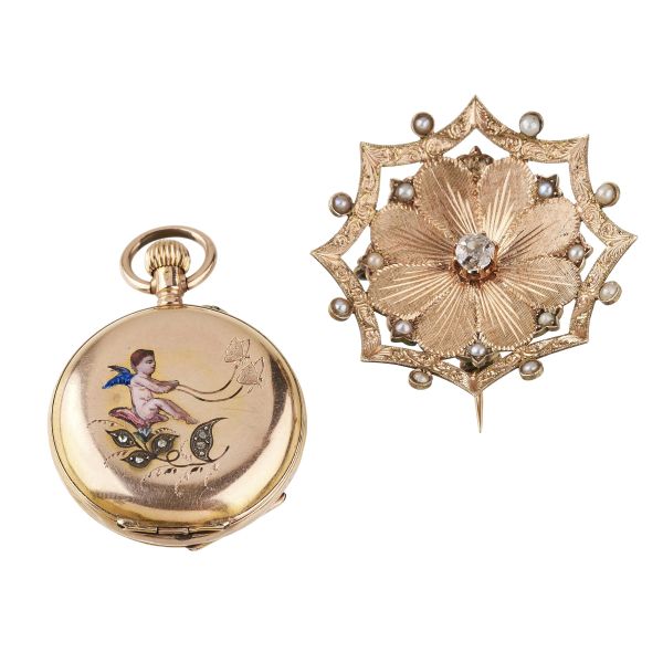 



SMALL REMONTOIRE POCKET WATCH WITH A FLORAL BROOCH IN 14KT GOLD 