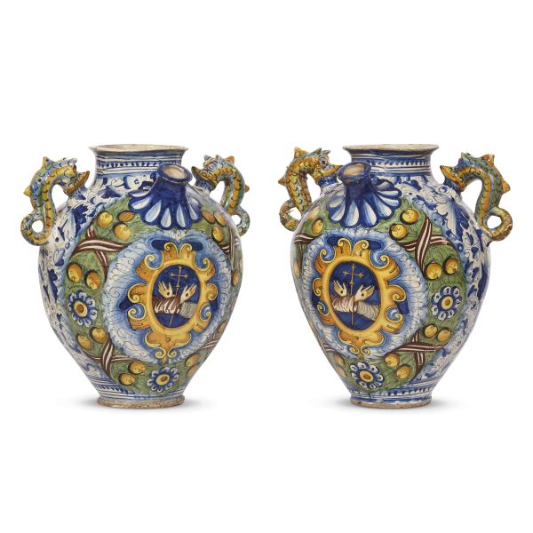 A PAIR OF SPOUTED PHARMACY JARS, MONTELUPO, CIRCA 1640-1660