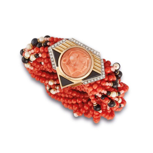 



BRACCIALE TORCHON CON CORALLO PERLE E ONICE