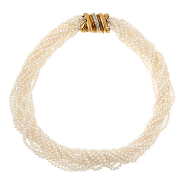 



COLLIER TORCHON CON PERLE E DIAMANTI