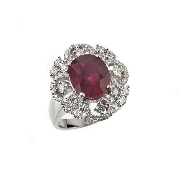 



ANELLO FLOREALE CON RUBINO E DIAMANTI