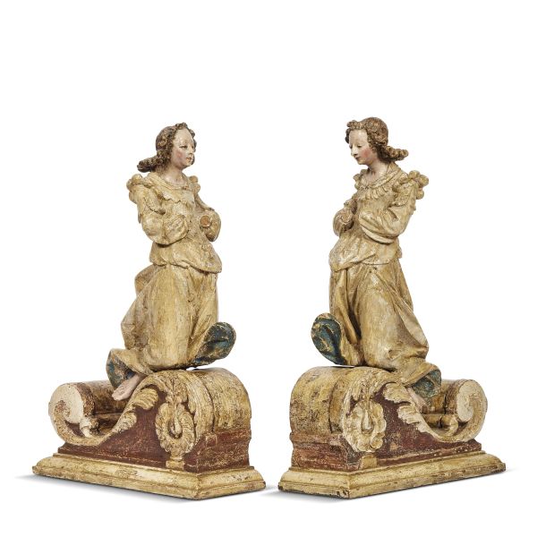 Flemish, late 16th century, A pair of angels, carved and painted wood, 44x29x11 cm (each)