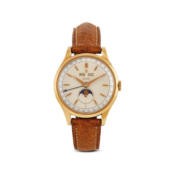 Rolex - 



ROLEX REF. 8171 PADELLONE N. 6863XX YELLOW GOLD WRISTWATCH, 1950