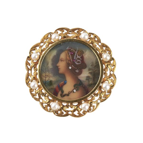 



18KT YELLOW GOLD BROOCH WITH A MINIATURE 