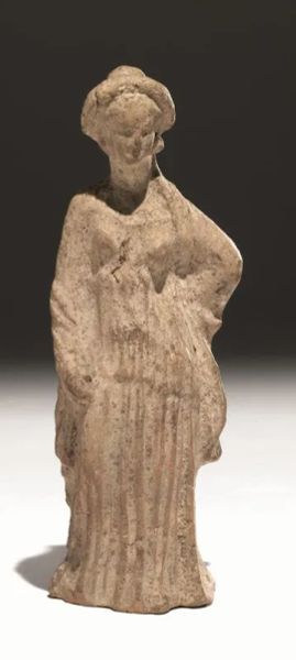  Statuetta femminile, cosiddetta  Tanagrina   