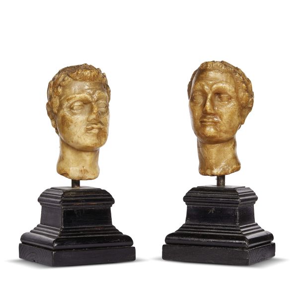Roman, 17th century, A pair of small heads of Emperors, 12,5x6,5x8,5 cm, on a wooden base, h. 21 cm (overall)