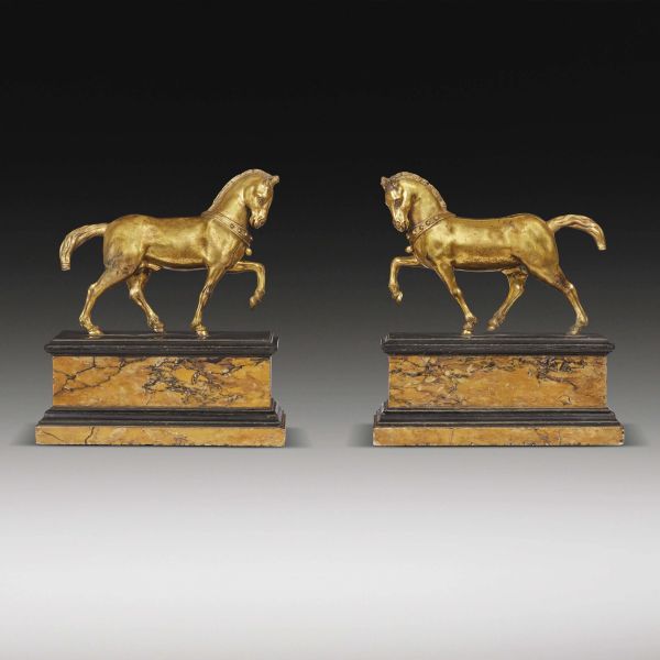Venetian, late 17th century, A pair of horses, gilt bronze on marble base