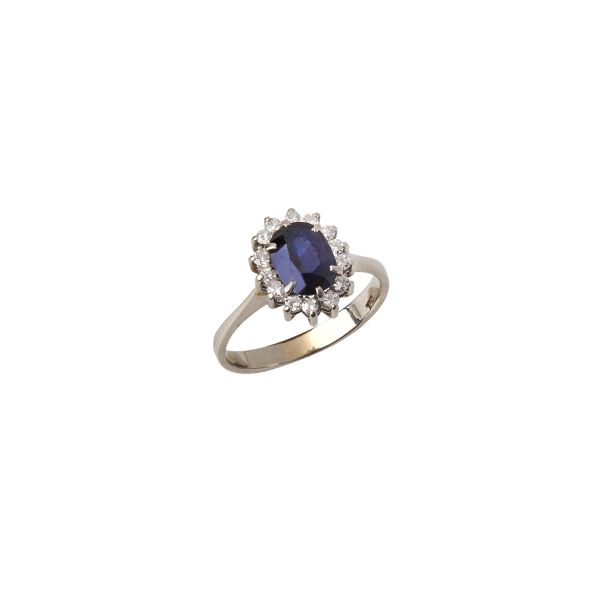 



SAPPHIRE AND DIAMOND DAISY RING IN 18KT WHITE GOLD