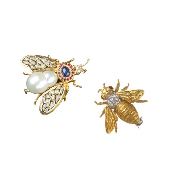 



TWO FLY SHAPED BROOCHES IN 18KT TWO TONE GOLD