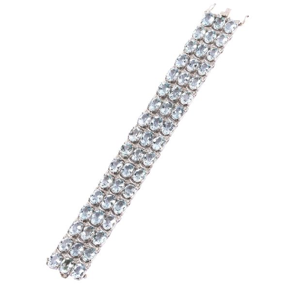 



AQUAMARINE AND DIAMOND BAND BRACELET IN 18KT WHITE GOLD