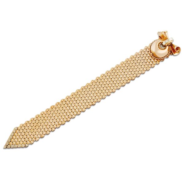 



BELT BRACELET WITH A HIDDEN WATCH IN 18KT YELLOW GOLD