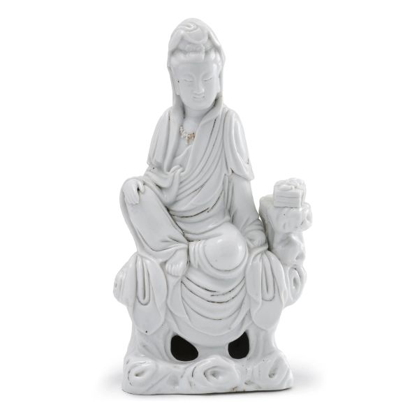 



A DEHUA PORCELAIN FIGURE OF SEATED GUANYIN, CHINA, QING DYNASTY, 19TH CENTURY 