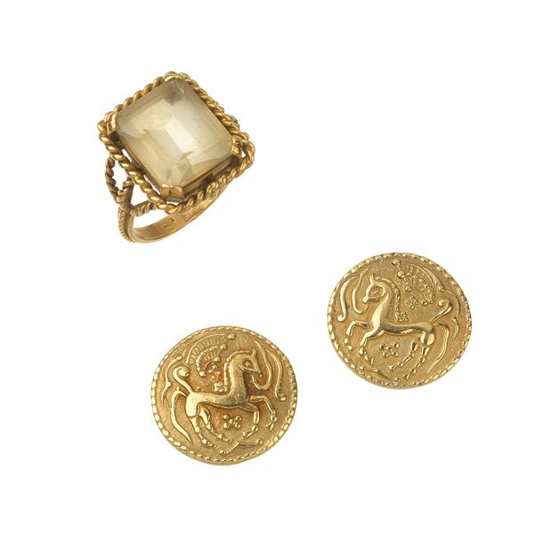 



CLIP EARRINGS WITH A RING IN 18KT YELLOW GOLD 