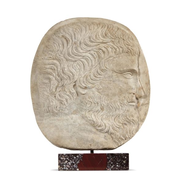 Frederician Sculptor, 13th century, Portrait of an Imperial official on Clipeus, marble, 50,5x45,5 cm, mounted on red marble base (h. 58 cm overall)