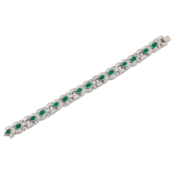 



EMERALD AND DIAMOND BAND BRACELET IN 18KT WHITE GOLD