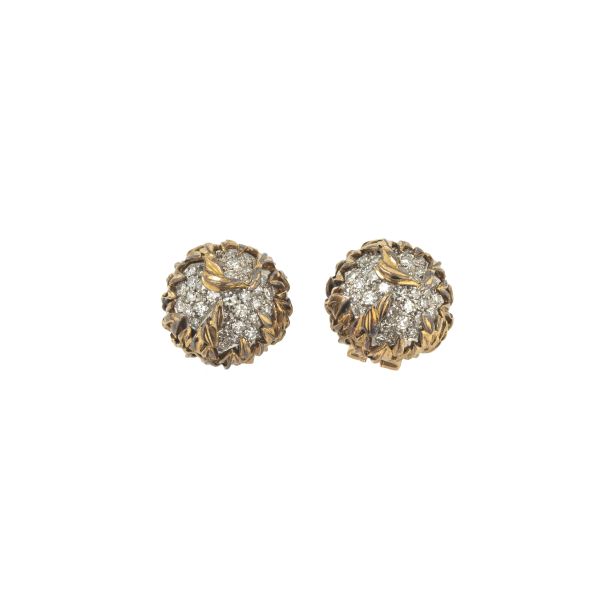 



DIAMOND STUD EARRINGS IN 18KT TWO TONE GOLD
