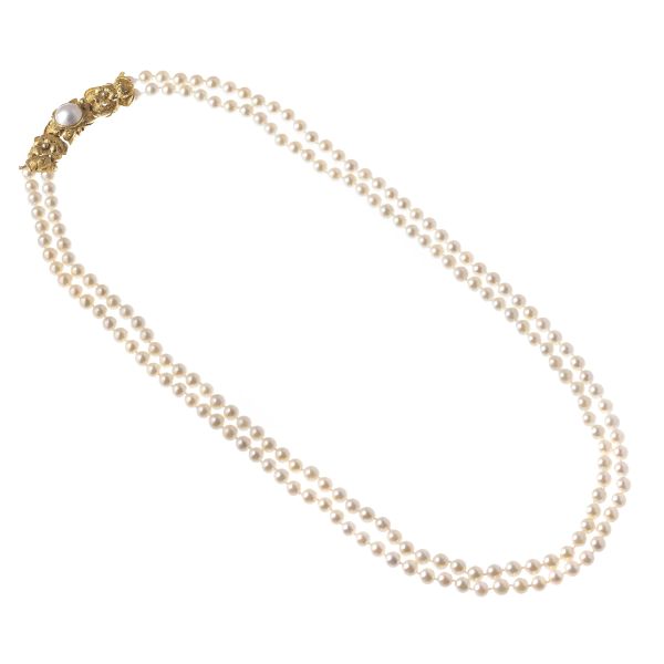 



LONG PEARL NECKLACE IN 18KT YELLOW GOLD