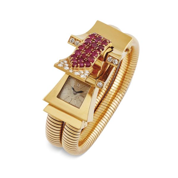 



RUBY AND DIAMOND BRACELET WITH A HIDDEN WATCH IN 14KT GOLD