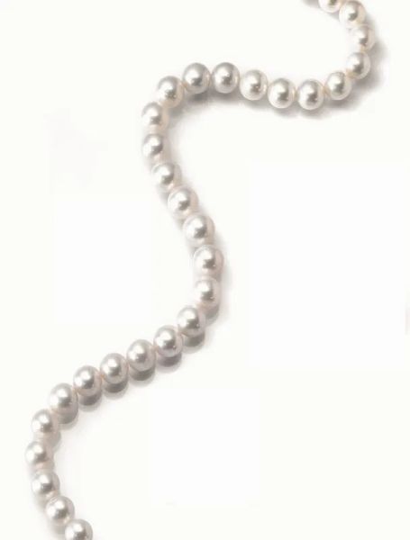  Collana in perle, oro bianco e zaffiri                        