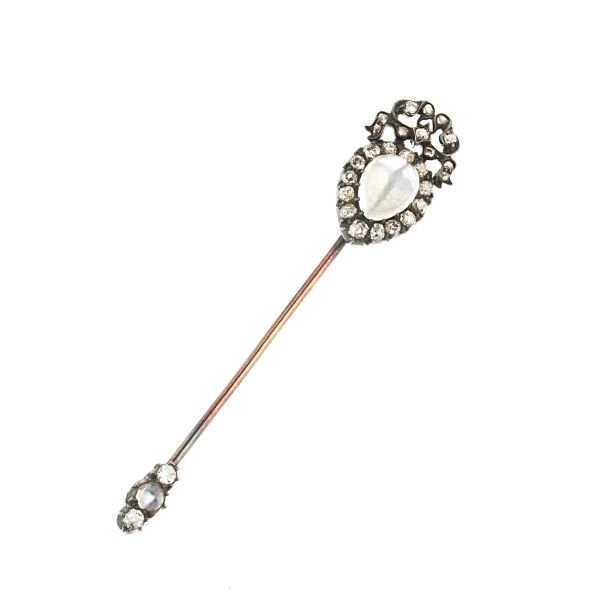 MOON STONE AND DIAMOND PIN IN SILVER AND GOLD