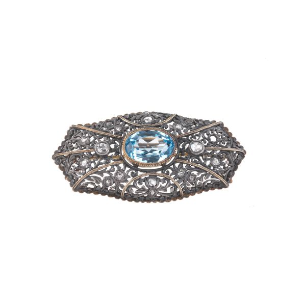 SYNTHETIC SPINEL AND DIAMOND BROOCH IN SILVER AND GOLD