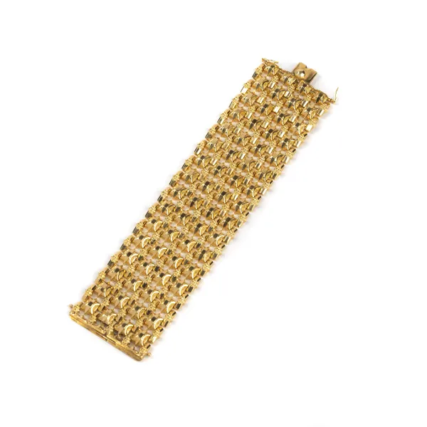



WIDE BAND BRACELET IN 18KT YELLOW GOLD