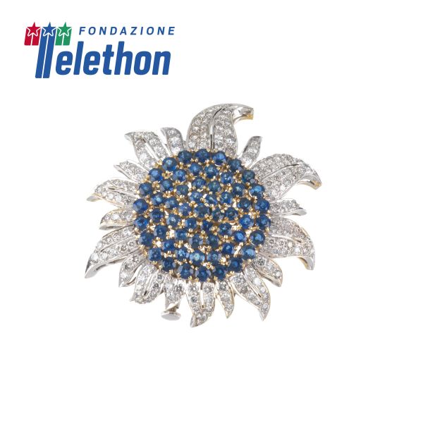 SAPPHIRE AND DIAMOND FLOWER BROOCH IN 18KT TWO TONE GOLD