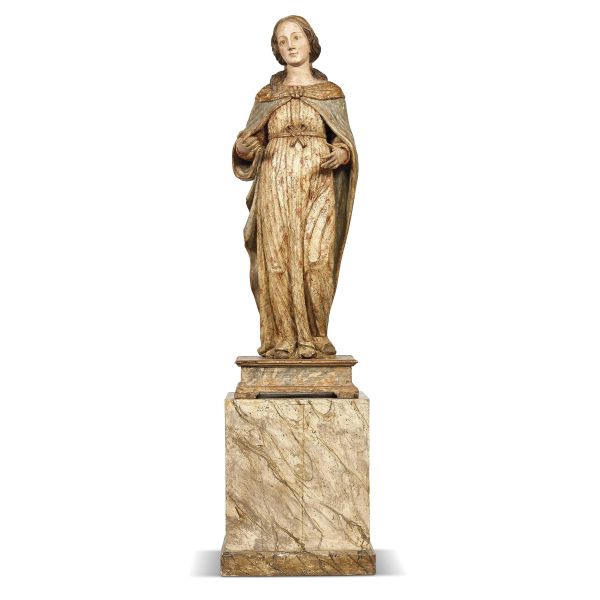 Northern Italian, 16th century, The Virgin announced, carved and painted wood,133x47x43 cm, on a wooden marble-like painted base (base 60x53x53 cm)