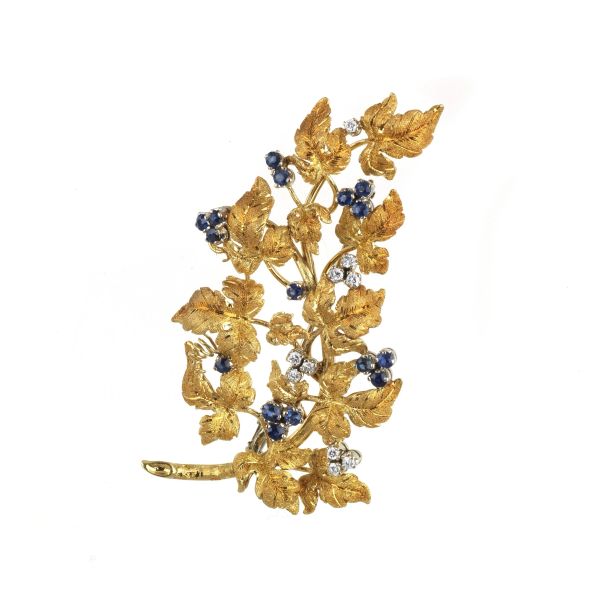 SAPPHIRE AND DIAMOND FLOWERING BRANCH BROOCH IN 18KT TWO TONE GOLD
