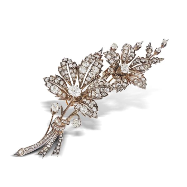 



BIG DIAMOND FLOWERING BRANCH BROOCH IN GOLD AND SILVER