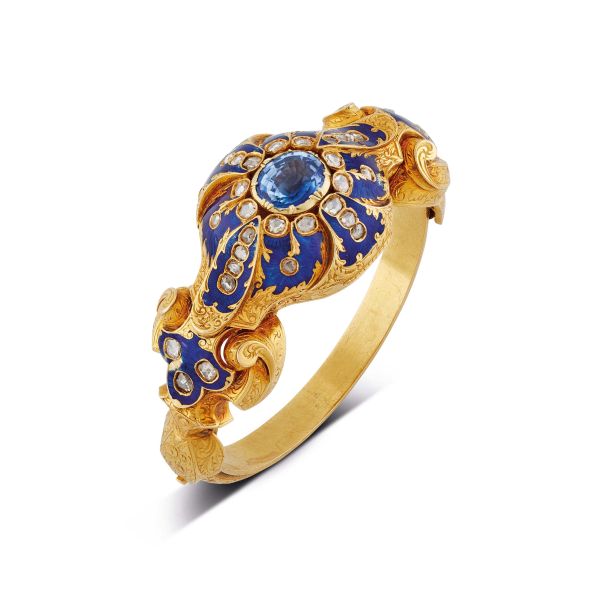 



BRACCIALE RIGIDO CON OROLOGIO A SCOMPARSA