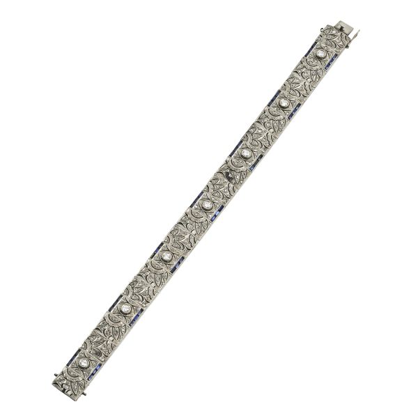 



BRACCIALE A FASCIA CON DIAMANTI E ZAFFIRI 