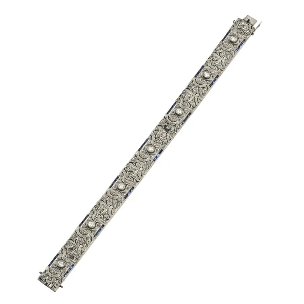 



DIAMOND AND SAPPHIRE BAND BRACELET IN 18KT WHITE GOLD