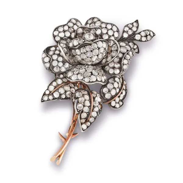



DIAMOND FLOWER-SHAPED BROOCH IN GOLD AND SILVER 