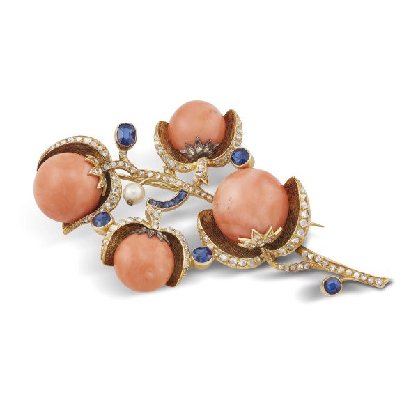 FLOWERING BRANCH-SHAPED CORAL SAPPHIRE AND DIAMOND BROOCH IN 18KT YELLOW GOLD AND SILVER