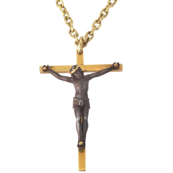 18KT YELLOW GOLD NECKLACE WITH A GOLD AND METAL CROSS 