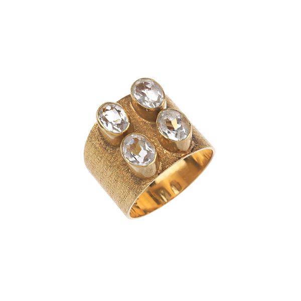 



SEMIPRECIOUS STONE BAND RING IN 18KT YELLOW GOLD