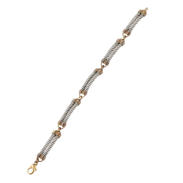 



CHAIN BRACELET IN 18KT YELLOW GOLD AND STEEL