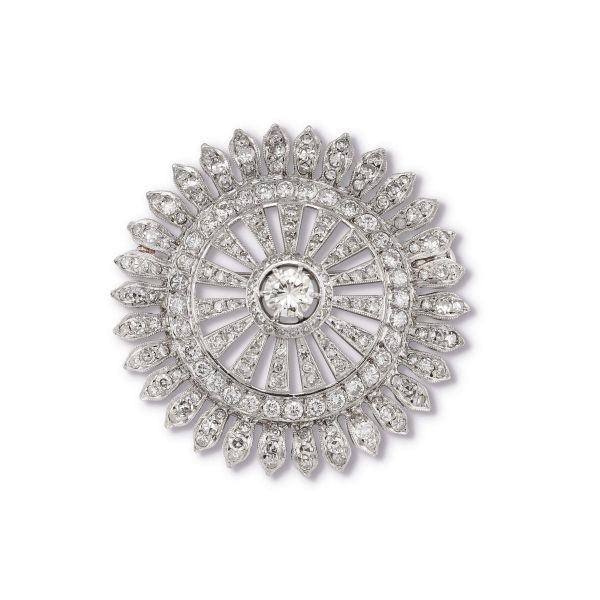 



SUNBURST-SHAPED DIAMOND BROOCH IN 18KT WHITE GOLD