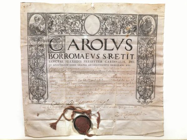 BORROMEO, San Carlo (1538-1584). Concessione di indulgenza con firma autografa &ldquo;Carolus Car[dina]lis Borromeus Archiep[iscopu]s&rdquo;, datata 1 gennaio 1570, e con sigillo di ceralacca entro scatola.
