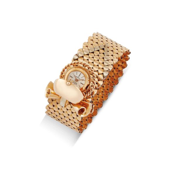 BRACCIALE A NASTRO CON OROLOGIO A SCOMPARSA