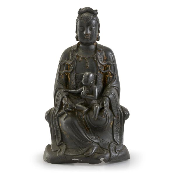 



A BRONZE FIGURE OF GUANYIN WITH CHILD, CHINA, QING DYNASTY, 17TH CENTURY