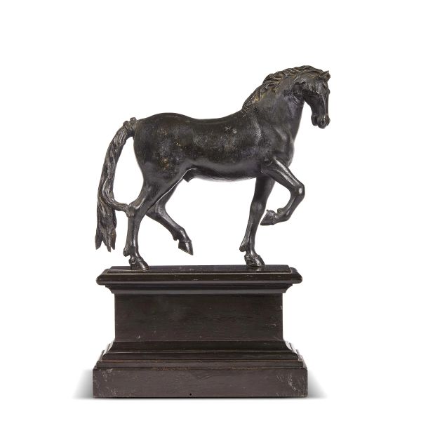 Florentine, 16th century, A pacing horse, bronze, 17,5x20x6 cm on a wooden base, 10,3x17,5x8,6 cm