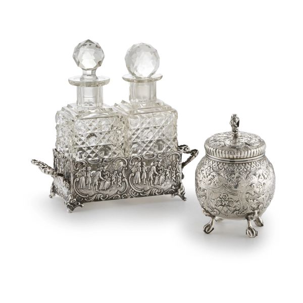 A SILVER AMPOULE HOLDER, GERMANY, 20TH CENTURY AND A SILVER TEA CADDY, HOLLAND, 19TH CENTURY WITH IMPORT MARKS IN LONDON IN 1891