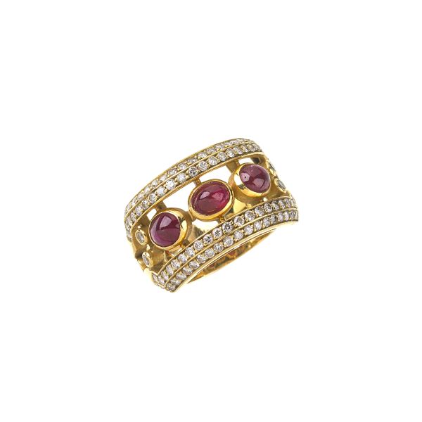 



RUBY AND DIAMOND BAND RING IN 18KT YELLOW GOLD