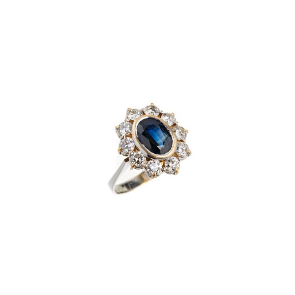 SAPPHIRE AND DIAMOND RING IN 18KT TWO TONE GOLD