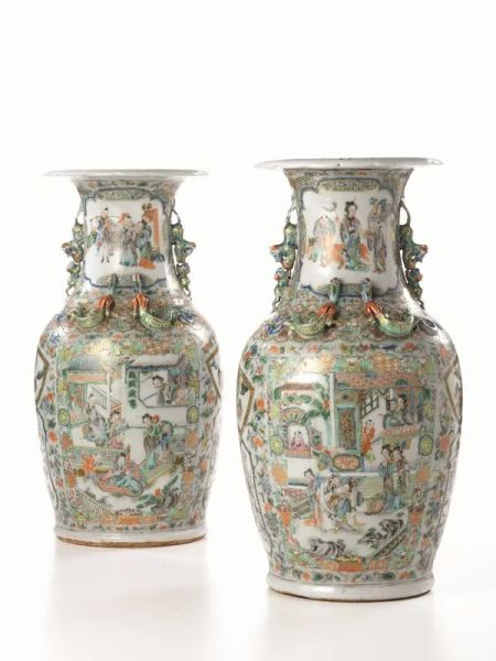 Due vasi Cina sec. XIX-XX, in porcellana Canton, decorati con motivi floreali e di personaggi entro riserve sagomate, alt. cm 43