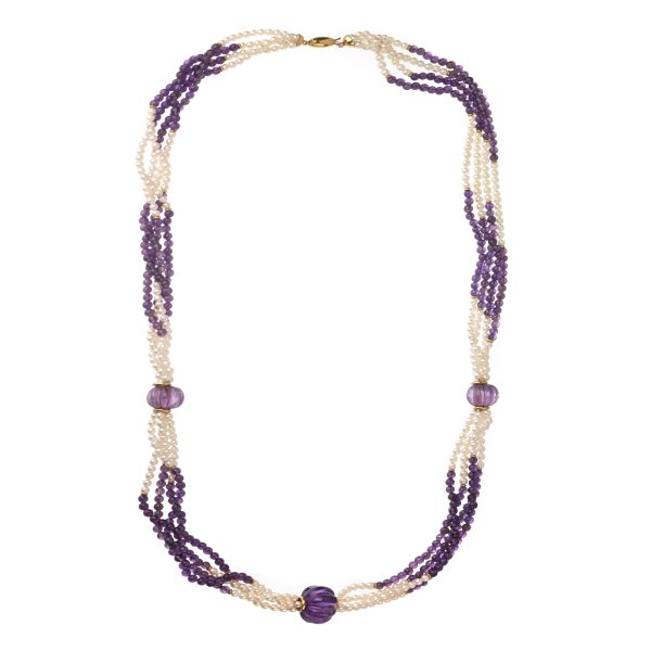 



PEARL AND AMETHYST TORCHON NECKLCE IIN 18KT YELLOW GOLD