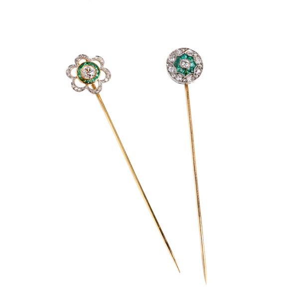 



TWO EMERALD AND DIAMOND PINS IN GOLD AND PLATINUM