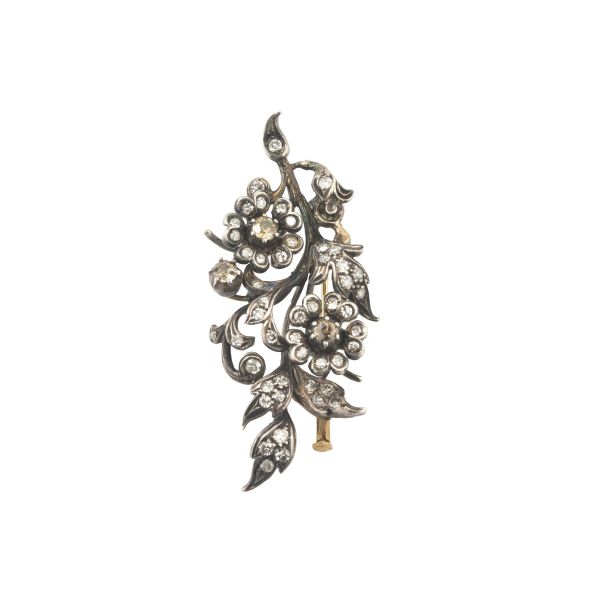 



DIAMOND FLOWERING BRANCH BROOCH IN 18KT YELLOW GOLD AND SILVER